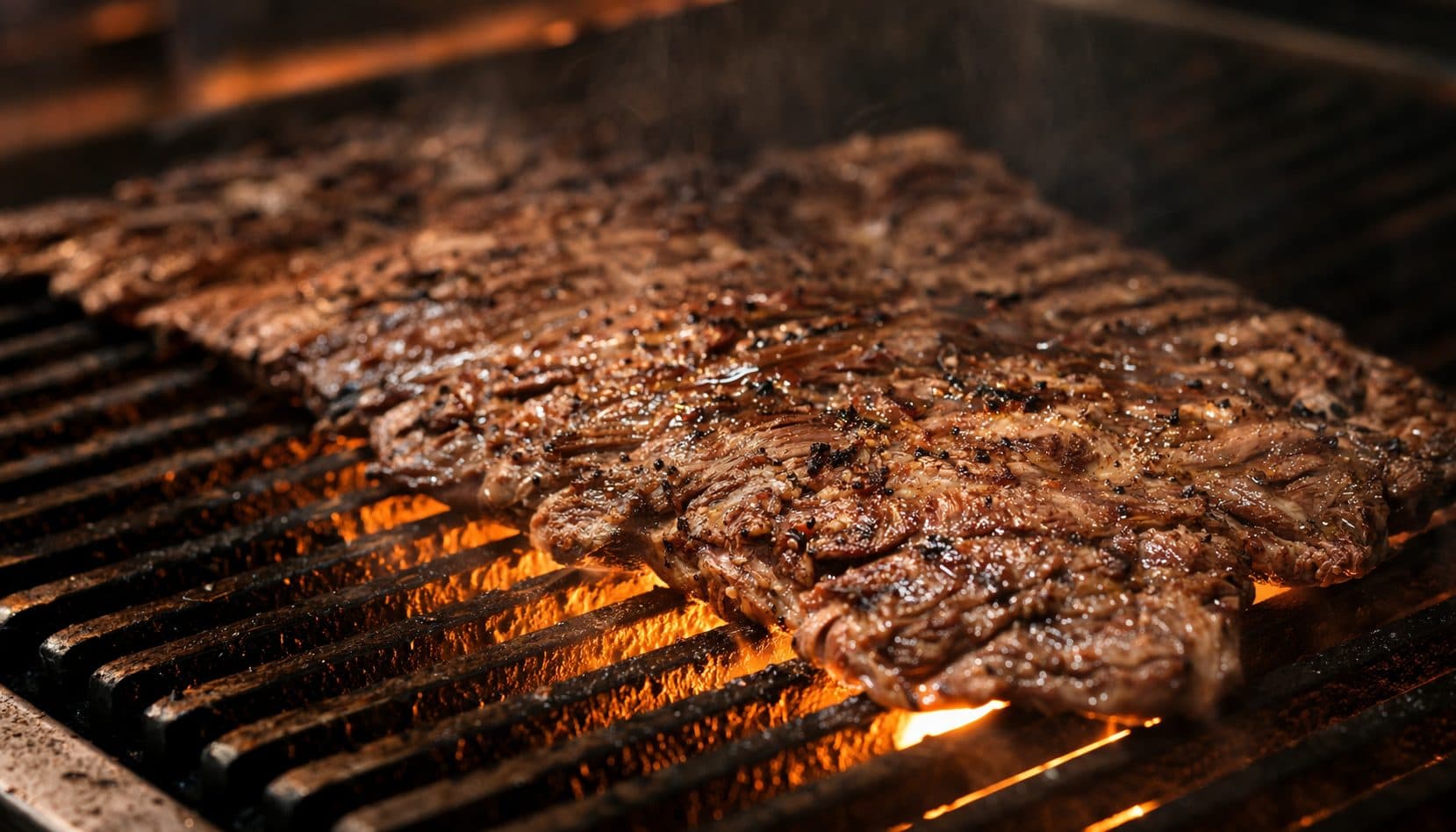 Steak on the grill at Baja Bud’s